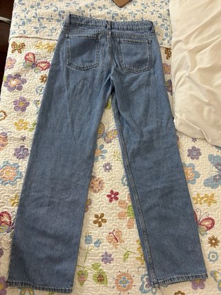 Tejanos azules con brillos plateados