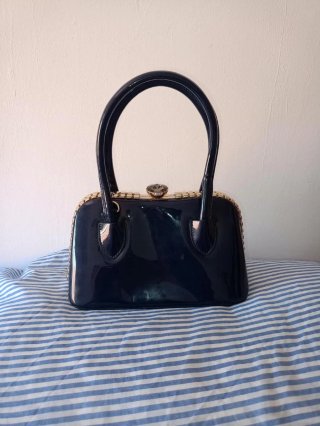 Bolso de mano M azul y dorado