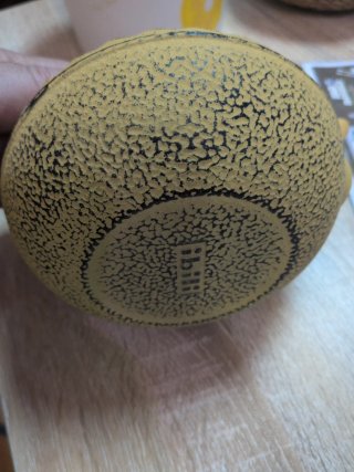 Tetera de hierro fundido amarilla