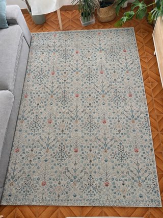 Alfombra azul y beige
