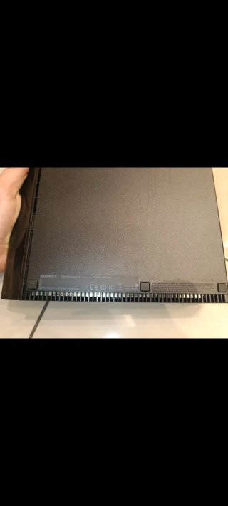 PlayStation 3 Super Slim 12GB + 2 Controller