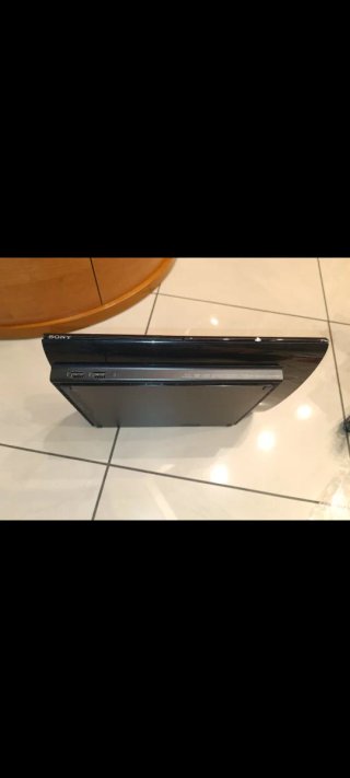PlayStation 3 Super Slim 12GB + 2 Controller