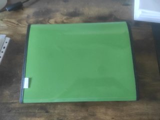 Carpeta archivador verde con cierre