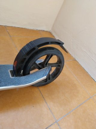 Patín plegable plateado