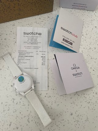 Swatch  Mission to Earthphase Moonshine Gold