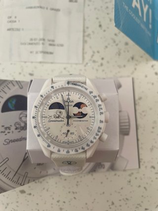 Swatch  Mission to Earthphase Moonshine Gold