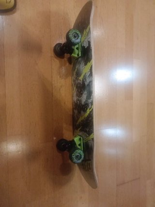 Skate Oxelo con diseño de lobo