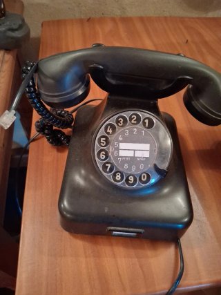 Teléfono antiguo de disco años 50
