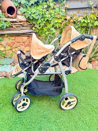Carrito gemelar de juguete