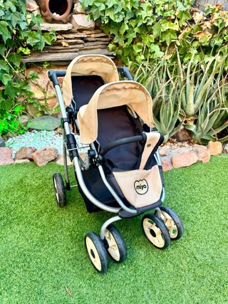 Carrito gemelar de juguete