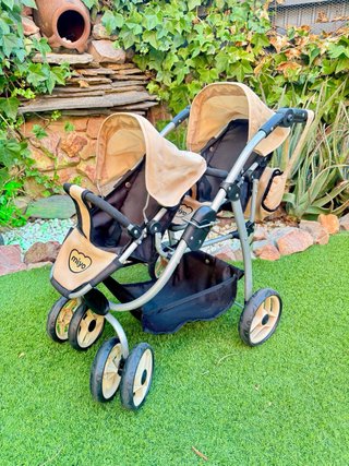 Carrito gemelar de juguete