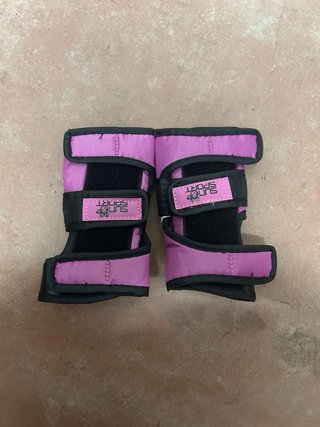 Pattini in linea rosa, protezioni incluse