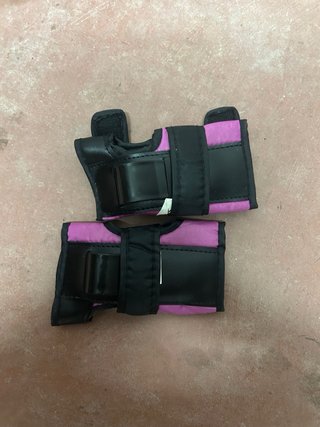 Pattini in linea rosa, protezioni incluse