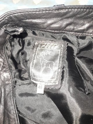 Gonna in pelle nera con tasche