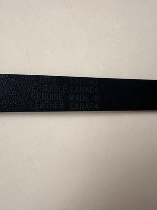 Cinturón de piel azul con lazo