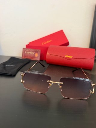 Gafas de sol Cartier doradas