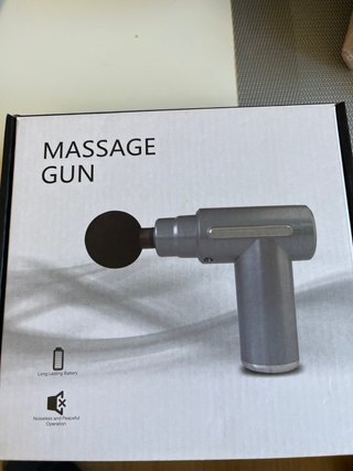 Pistola de masaje