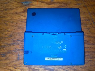Nintendo DSi con scatola e giochi Pokémon