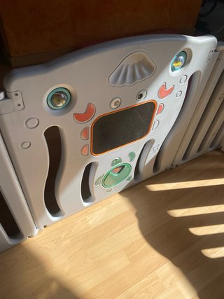 Parque infantil plegable con puerta