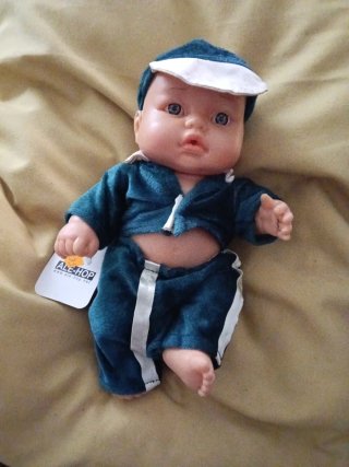 Muñeco bebé chándal azul y gorra,25cm