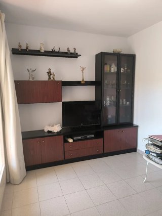 Mueble de salón madera y cristal