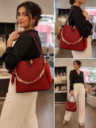 Bolso de mano rojo con cadena dorada