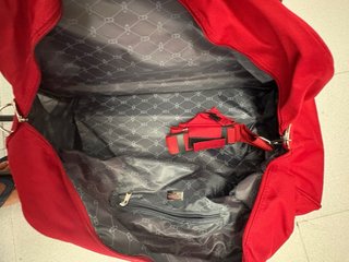 Bolsa de viaje roja sin estrenar