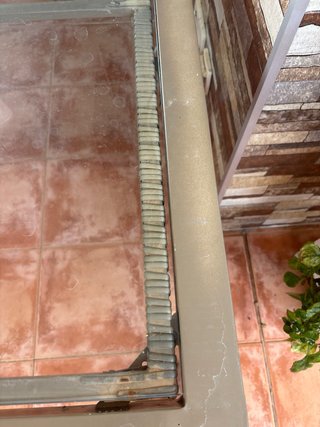 Tavolo da giardino in vetro e metallo