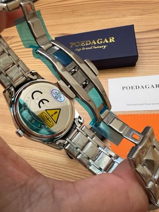 Reloj Poedagar nuevo.
