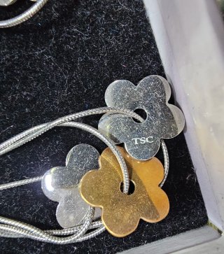 Orecchini pendenti fiore oro e argento