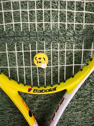 Raqueta de tenis Wilson amarilla
