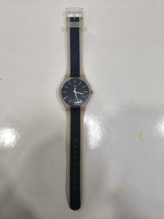 Reloj Swatch Swiss Made vintage transparente azul