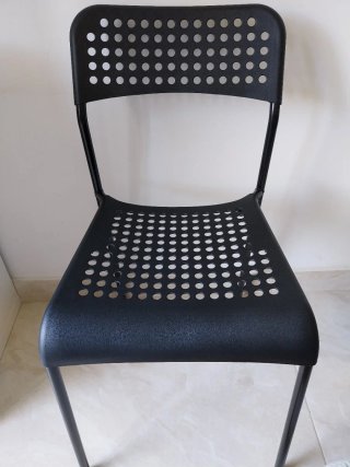 Ikea Silla negra con cojín verde