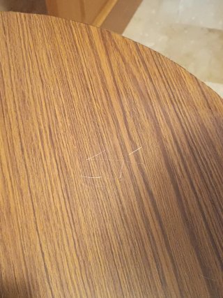 Mesa redonda de comedor de madera