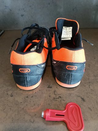 Zapatillas Kalenji Negras y Naranjas