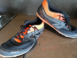 Zapatillas Kalenji Negras y Naranjas