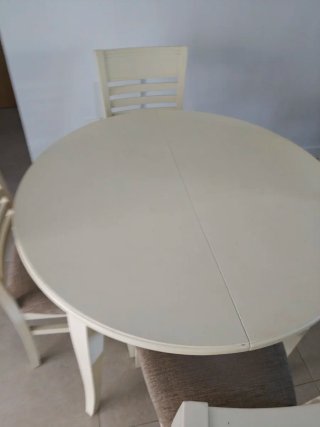 Mesa redonda con 6 sillas
