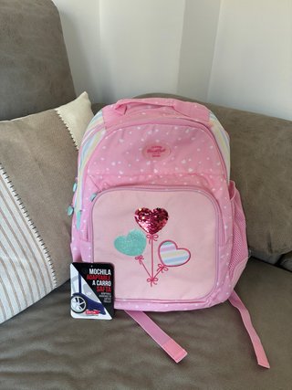 Mochila rosa adaptable a carro
