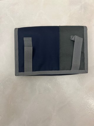 Monedero de cinturón azul y gris
