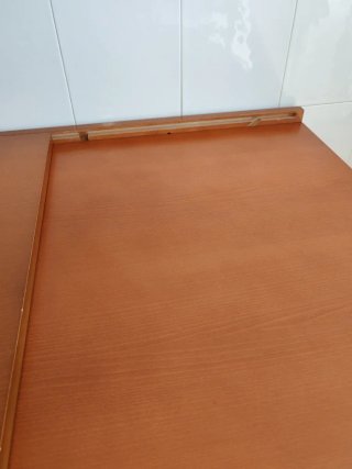 Mesa de comedor extensible de madera