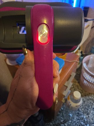 Aspiradora de mano con luz indicadora