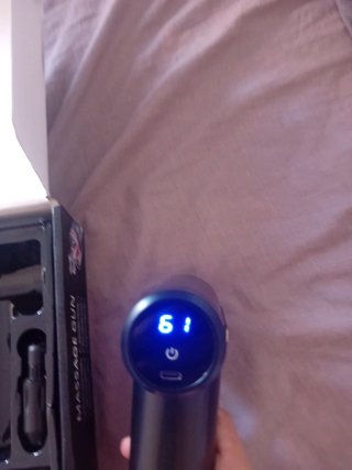 Pistola de masaje