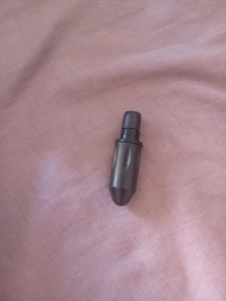 Pistola de masaje