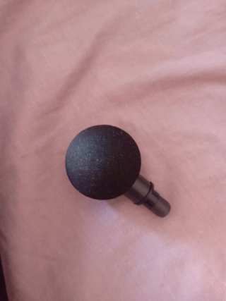 Pistola de masaje