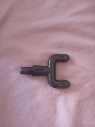 Pistola de masaje