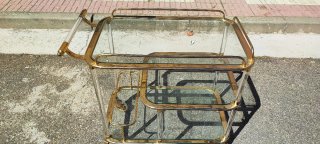 Mesa camarera cristal y metal dorada