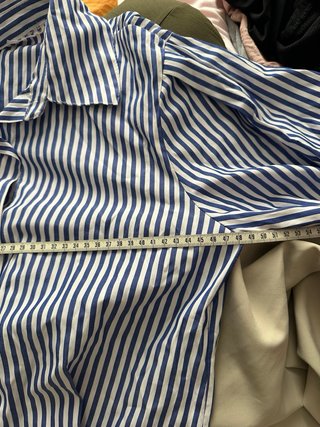 Camicia a righe blu e bianche