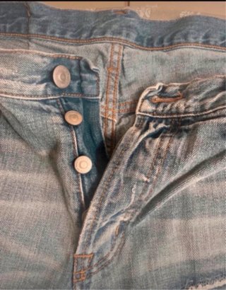 Jeans uomo blu con toppe
