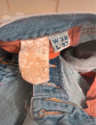 Jeans uomo blu con toppe