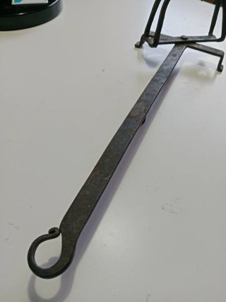 Tostador antiguo de pan hierro forjado